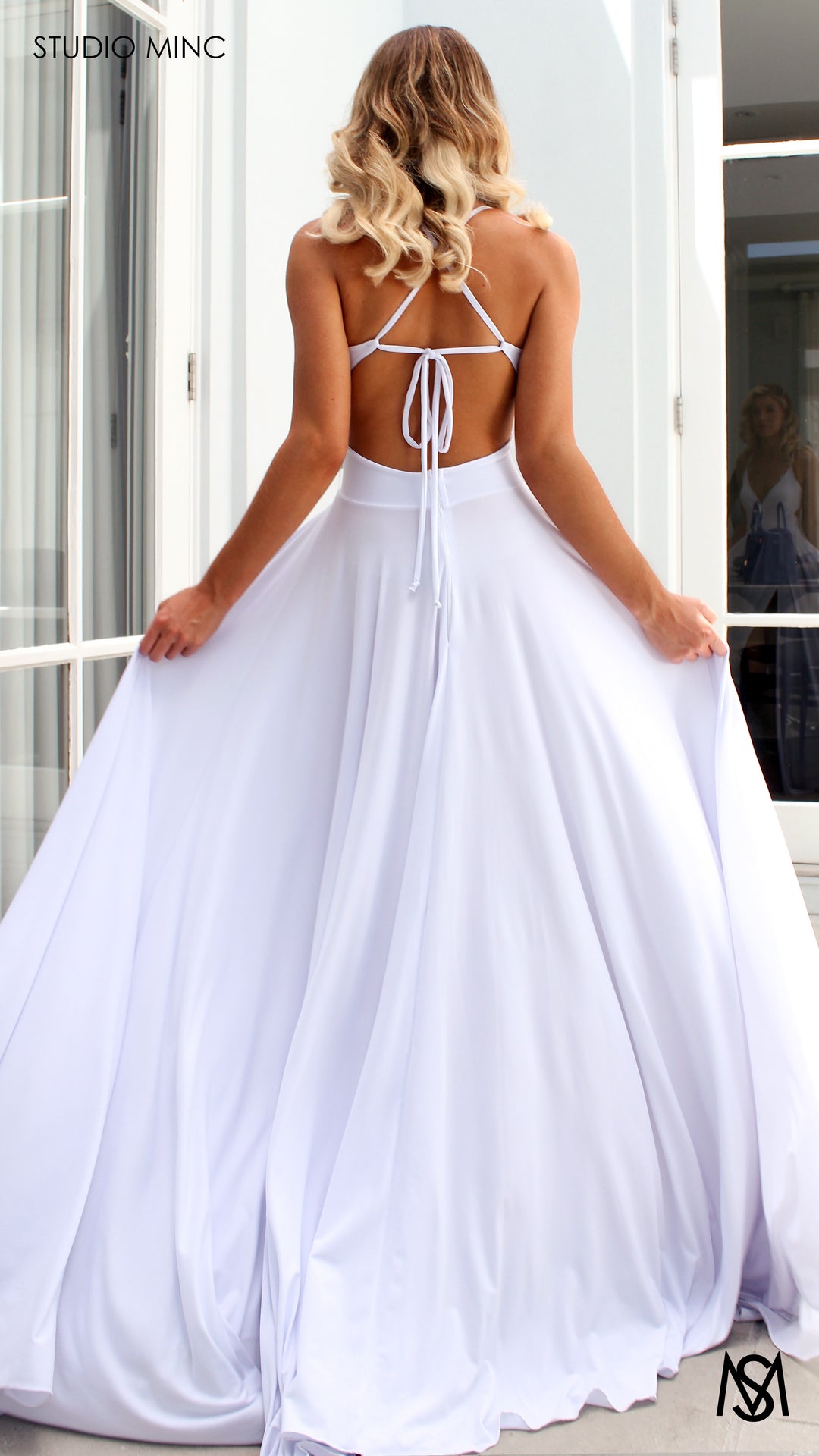 COSMO | White Flowy Formal Dress with Leg Split & Cut Outs  STUDIO MINC