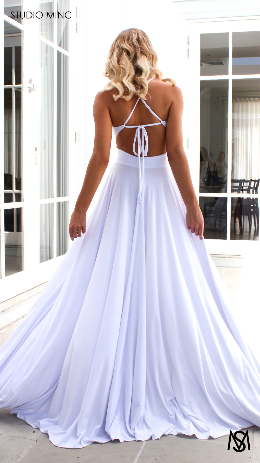 COSMO | White Flowy Formal Dress with Leg Split & Cut Outs STUDIO MINC COSMO | White Flowy Formal Dress with Leg Split & Cut Outs STUDIO MINC